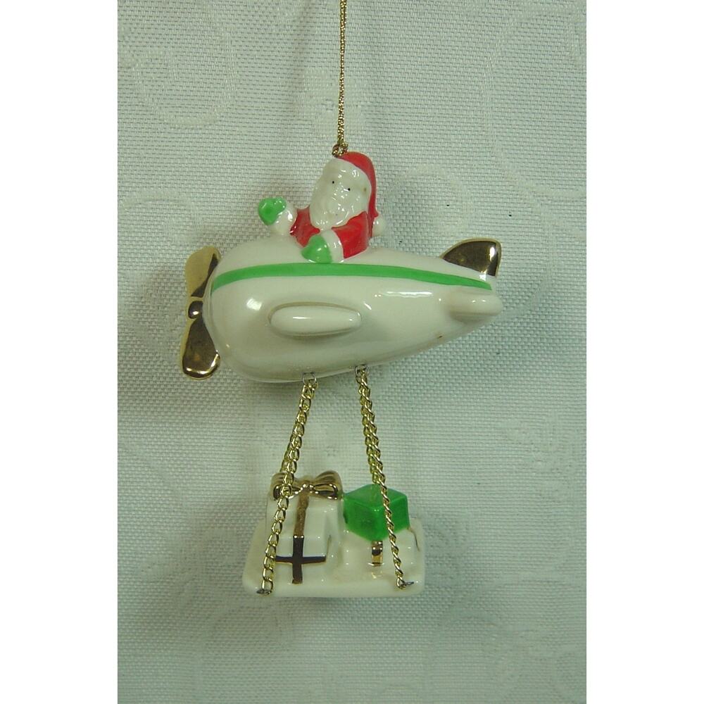 MIKASA ORNAMENT-HOLIDAY MAGIC-SANTA IN AIRPLANE WITH PACKAGES